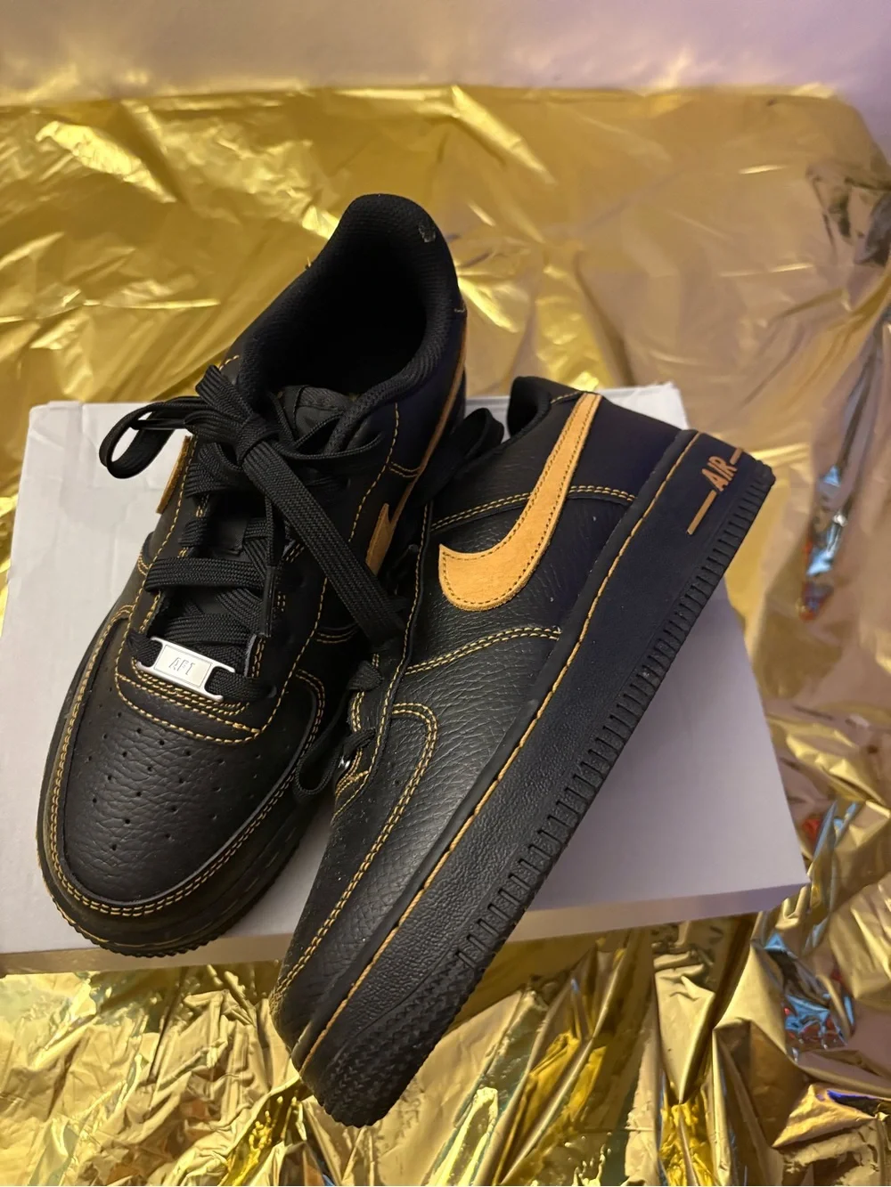 Nike Air Force One Sneakers with Gold Accent Details